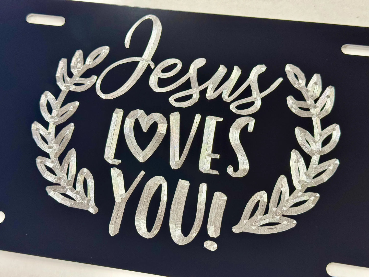 Deep Engraved Jesus Loves You Car Tag