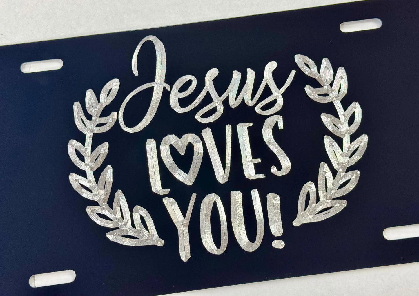 Deep Engraved Jesus Loves You Car Tag